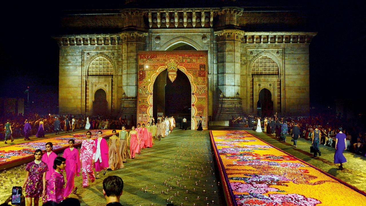 Models walk the ramp at the fashion show against the backdrop of the Gateway of India, on Thursday. Pic/Satej Shinde