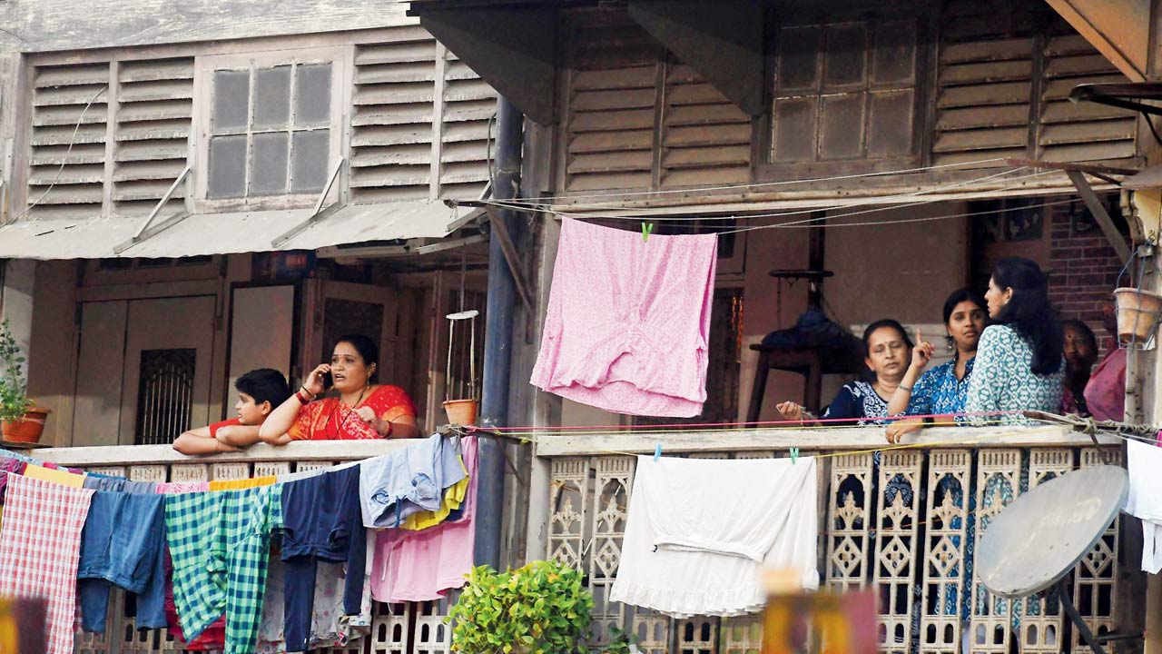 Neighbours were in a shock after the attack, at Parvati Mansion in Grant Road, on Friday. Pic/Ashish Raje