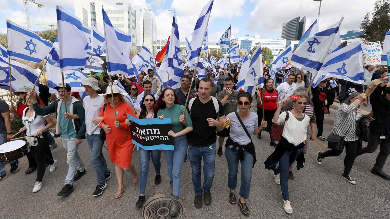 Parents and children demonstrated across the country ahead of school drop off. A small flotilla of paddleboards and kayaks tried to block a main maritime shipping lane in the northern city of Haifa. Some protesters barricaded the offices of a conservative think tank helping to spearhead the judicial changes. Pic/AFP