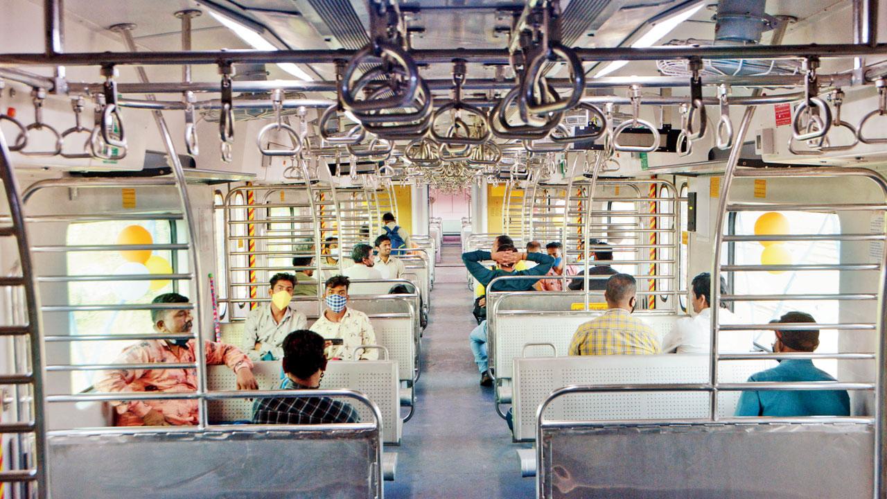 Commuters aboard an AC local train. File Pic/Satej Shinde
