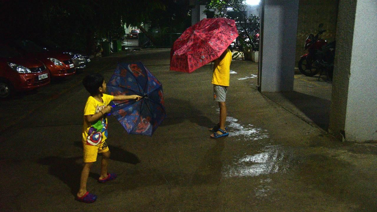 Children playing amid rainfall in Mumbai. Pic/Pradeep Dhivar