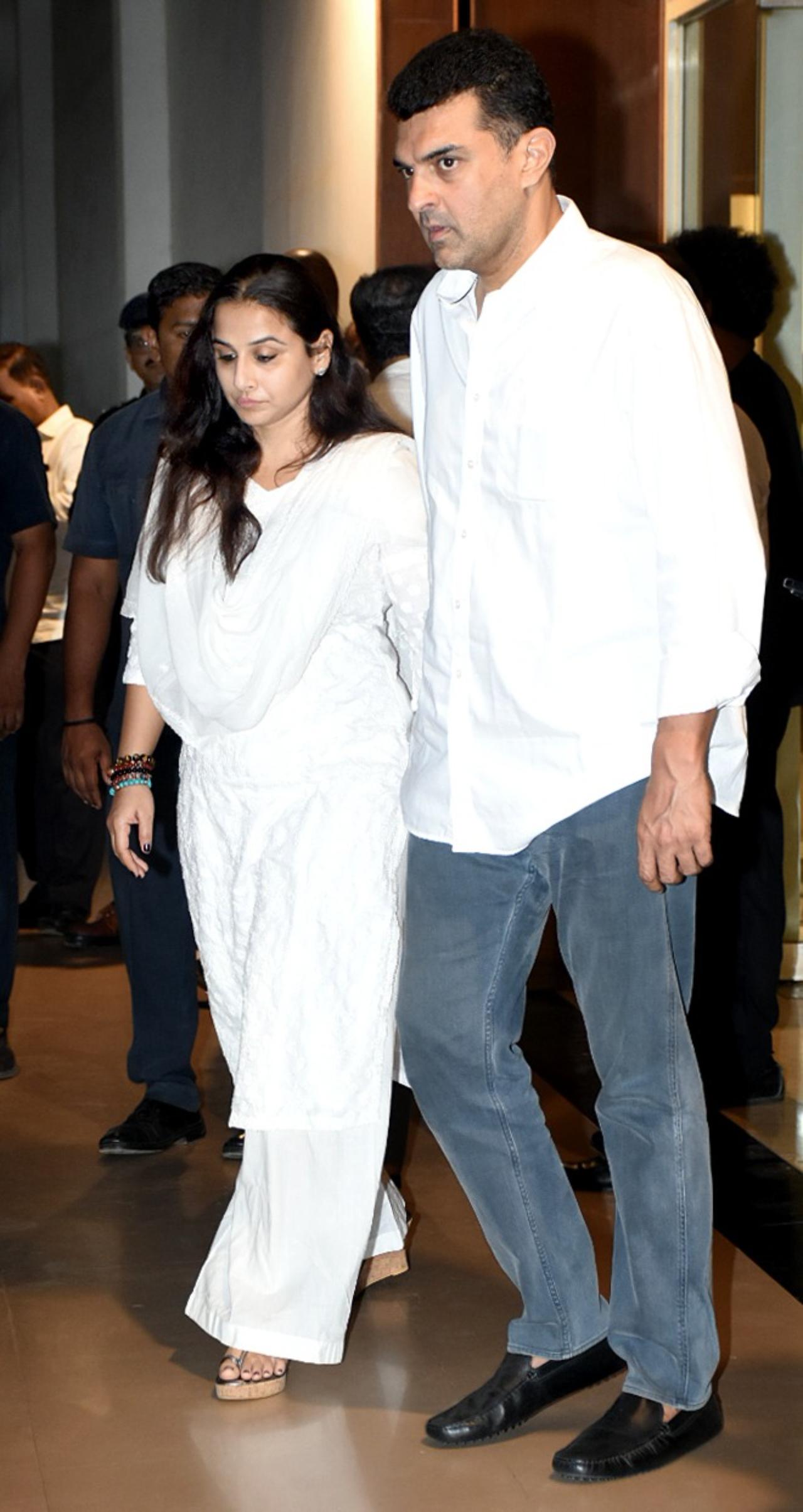 Actress Vidya Balan and her producer husband Siddharth Roy Kapur arrived together for the prayer meet