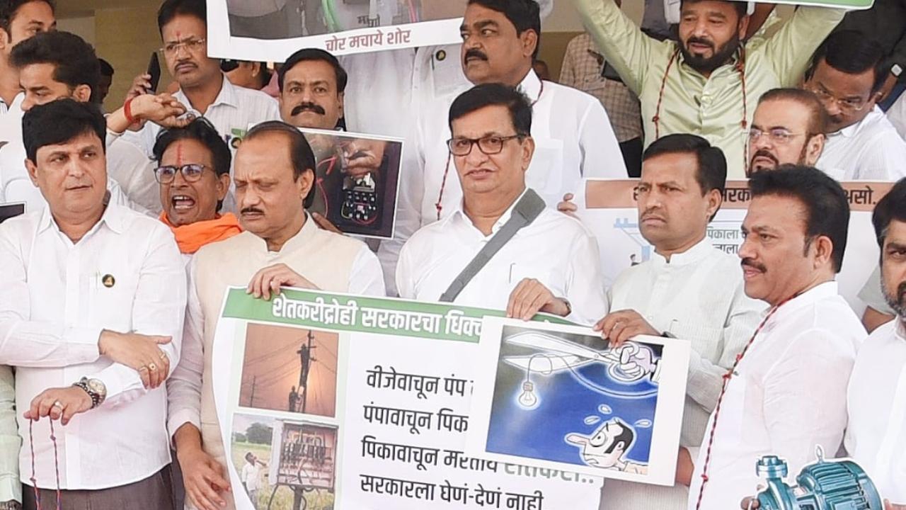 On Wednesday, opposition leaders including Ajit Pawar, Chhagan Bhujbal, Balasaheb Thorat, etc raised slogans and displayed plycards while protesting outside the entrance of Vidhan Bhavan