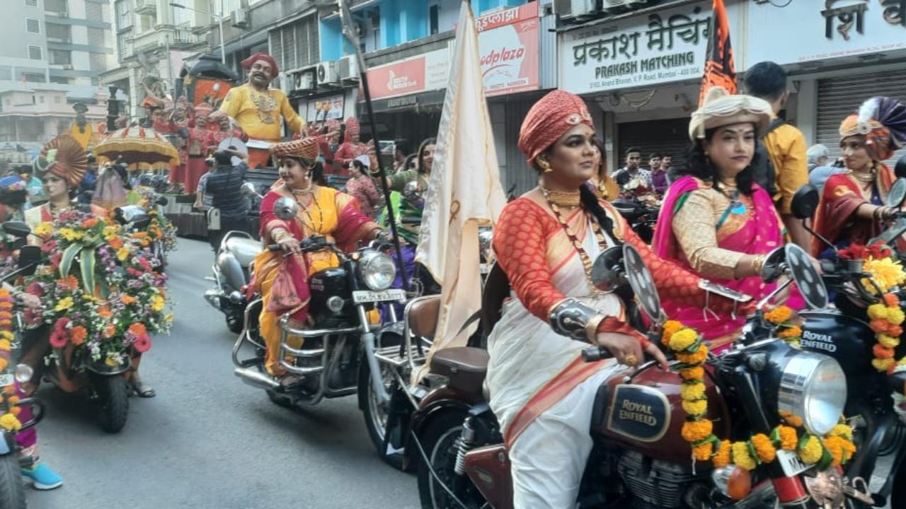 Mumbaikars wearing traditional attire Nauvari saree and jewellery participate in Shobha Yatra on a bullet for the Gudi Padwa celebration in Girgaum, Dadar areas in Mumbai Pic/Pradeep Dhivar