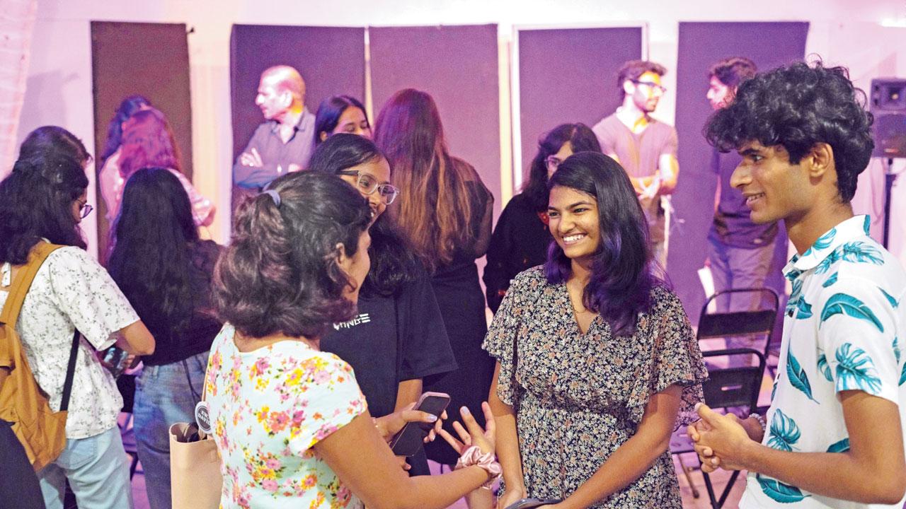 Participants interact after a reading session held by the group