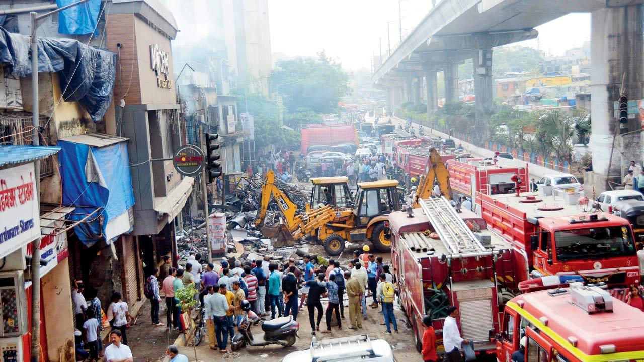 Fire brigade officials douse the fire that broke out at Sakinaka, on Monday. Pics/Sayyed Sameer Abedi