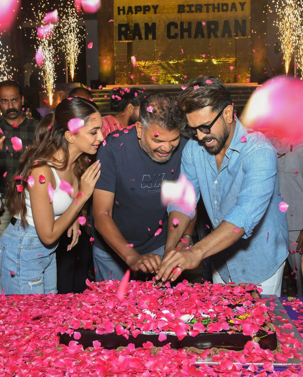 The pictures from the grand celebration was shared by the makers of the film who also announced that they have wrapped a song shoot for the film. The shoot had begun after Ram arrived in India post Oscars ceremony