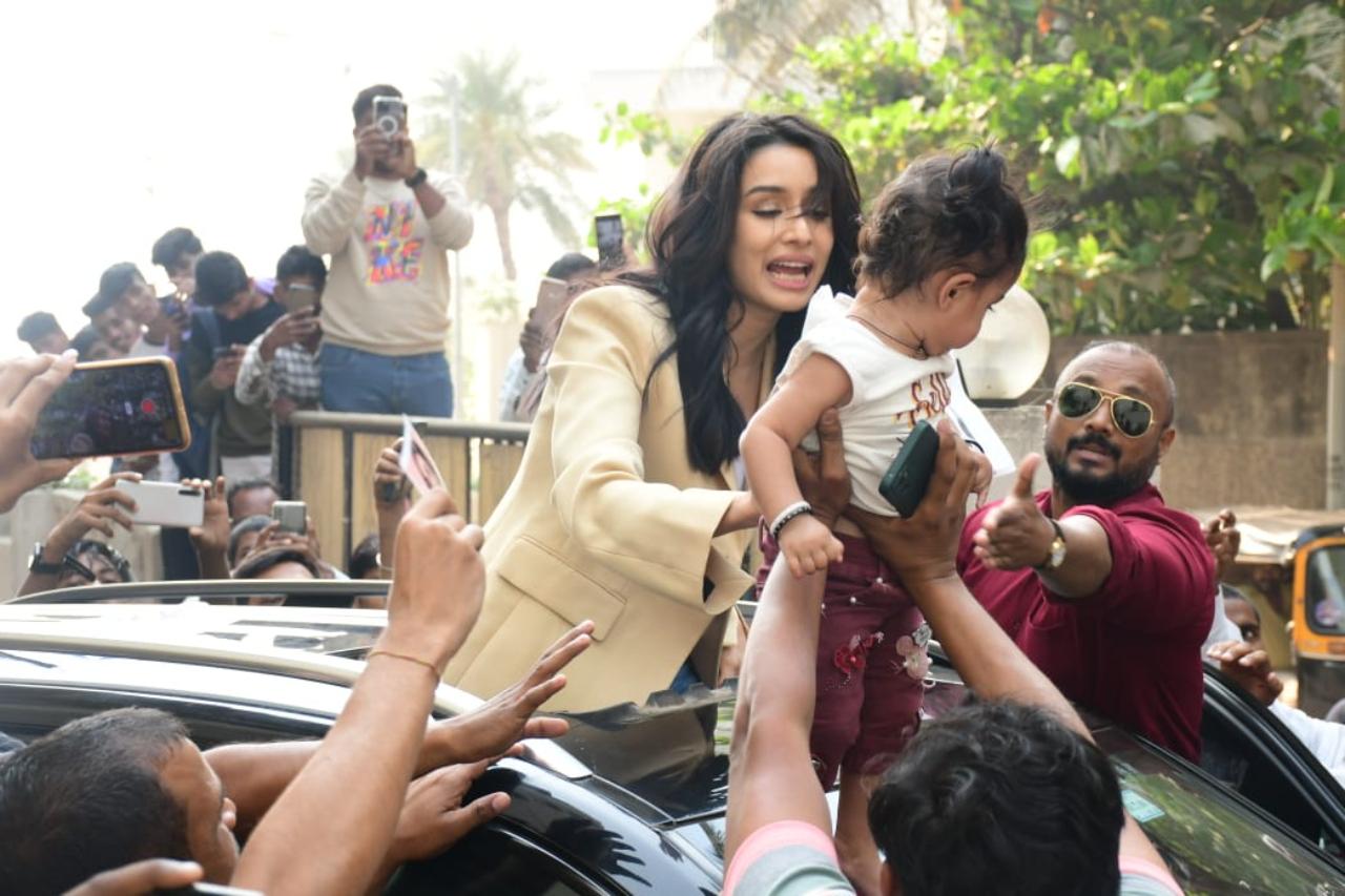 Shraddha opted for a rather formal look for her birthday. She was seen wearing a biege jacket over a white top and light blue denim pants