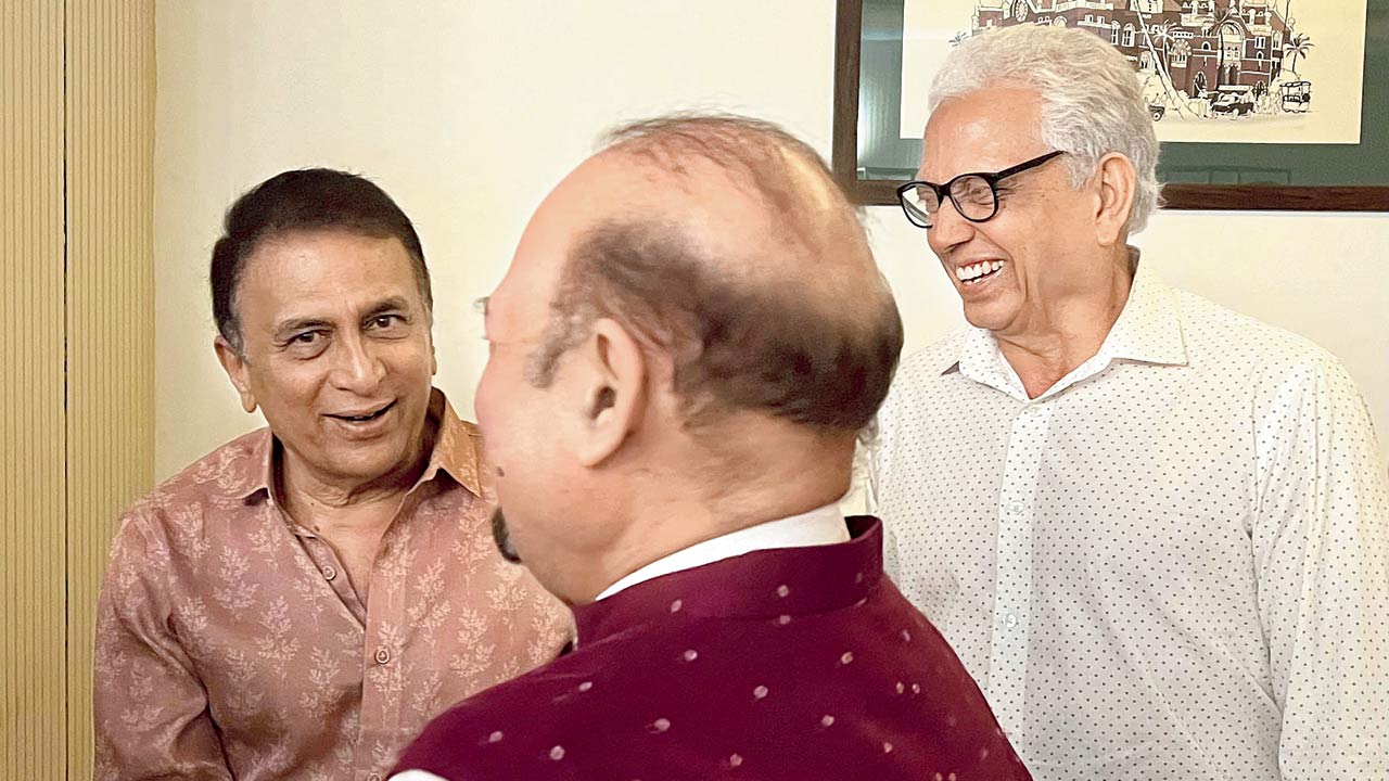 Host Sunil Gavaskar shares a lighter moment with a friend as ex-India teammate Mohinder Amarnath (right) joins in the fun. PICS/CLAYTON MURZELLO