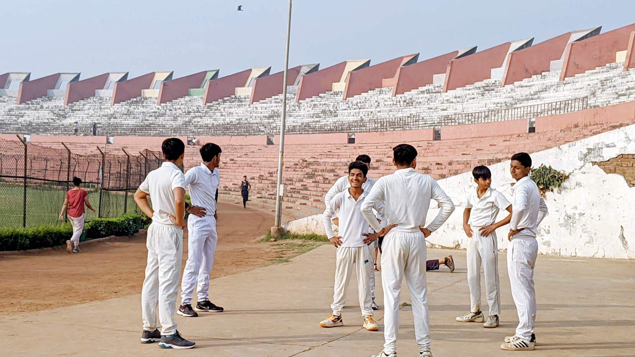 Young cricketers at a warm-up session