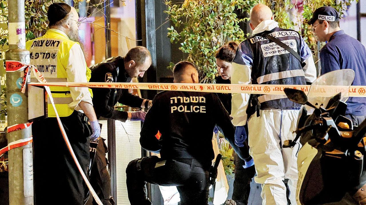 Three wounded in Tel Aviv shooting, hours after West Bank raid 