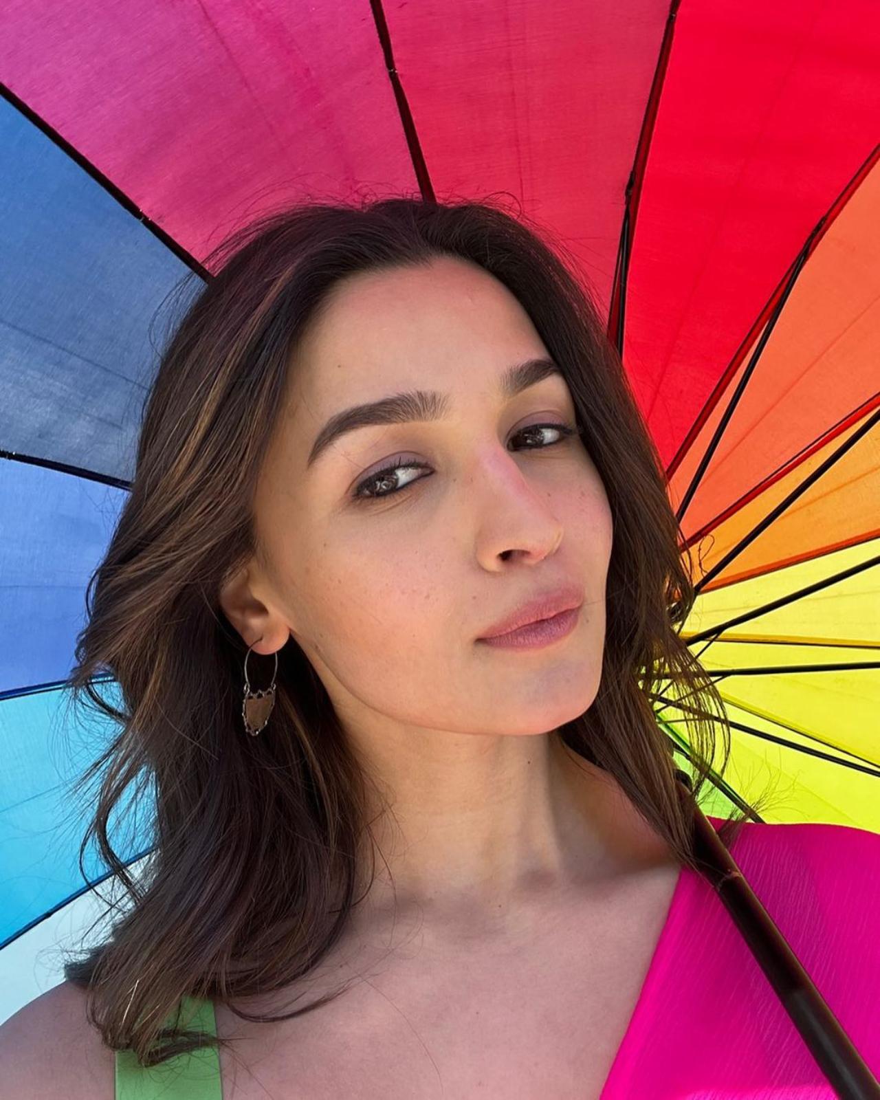 'Raazi' star Alia Bhatt took to her Instagram feed, posing with a colorful umbrella and wishing her fans a Happy Holi while hinting at her upcoming film 'Rocky Aur Rani Ki Prem Kahani'. The caption read, 