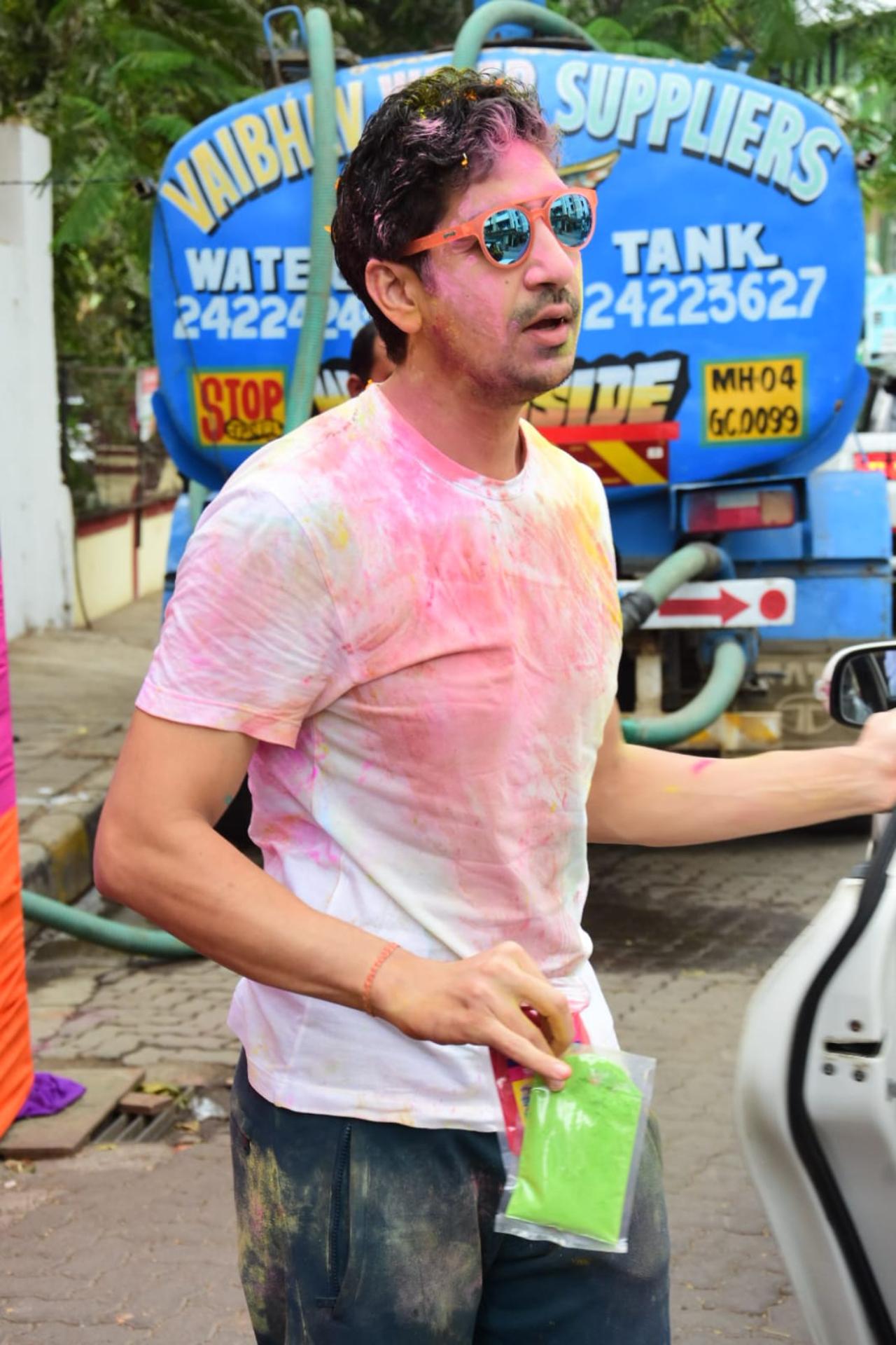 Director Ayan Mukerji was spotted in the city leaving a Holi party. He was seen covered in colours as he made his way out of  a party