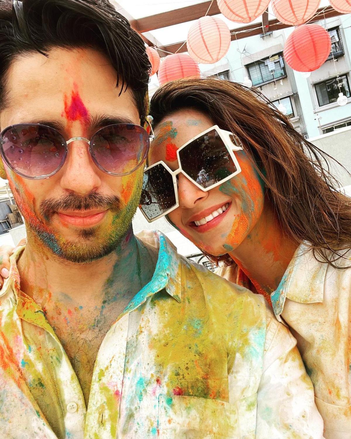 Newlyweds and one of the most adorable couples in Bollywood, Sidharth Malhotra and his better half, actor Kiara Advani celebrated their first Holi together after getting hitched. The 'Shershaah' star, Sidharth Malhotra on Tuesday took to Instagram to drop a cutesy selfie of him and his wife Kiara. Twinning in white, the couple looked adorable as they posed with colourful faces and flashed smiles for the click. 