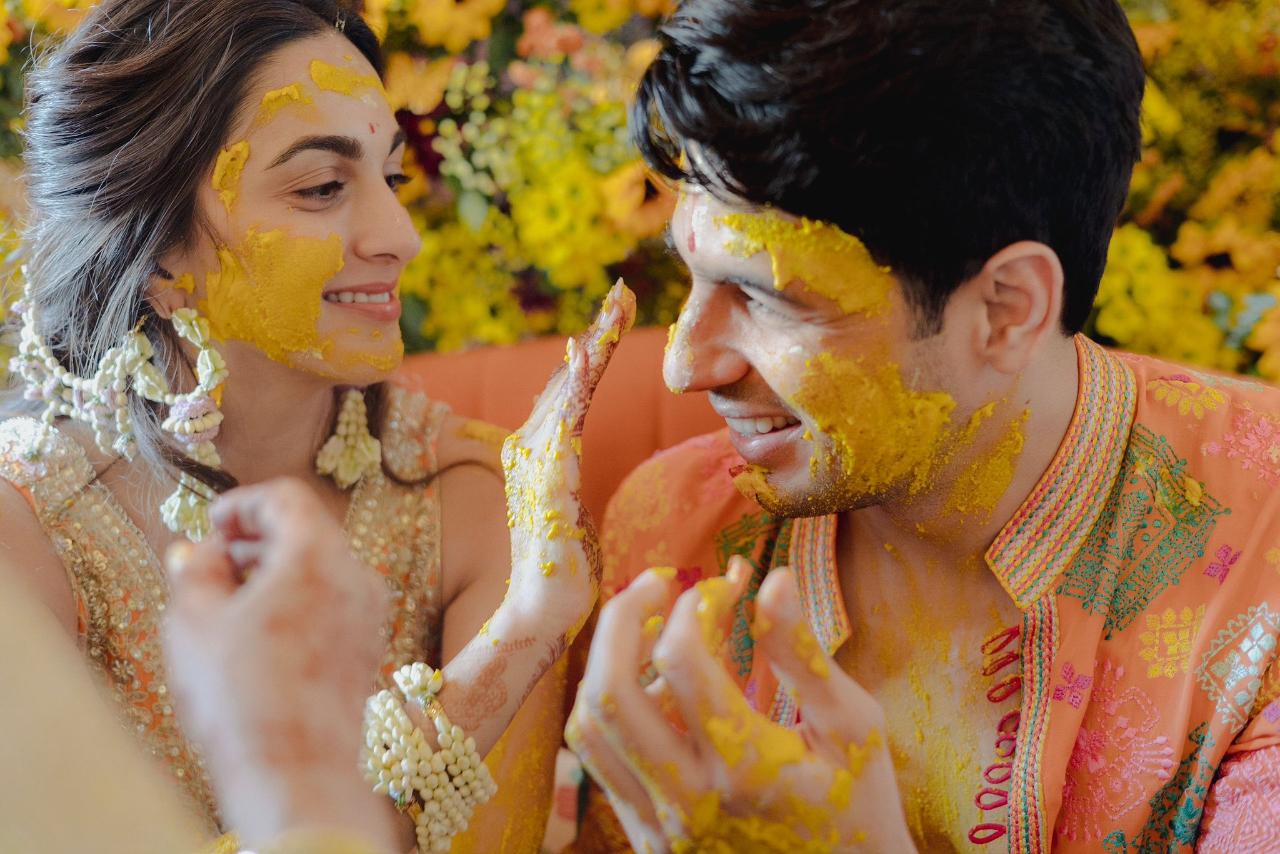 Bollywood actress Kiara Advani took to her Twitter feed on the auspicious occasion of Holi and shared some pictures with her newlywed hubby, actor Sidharth Malhotra. But instead of the regular pictures with 'gulaal' on the cheeks, the actress shared pictures of the couple's haldi ceremony and captioned it 'Happy Holi from me and my love to you and yours'.




