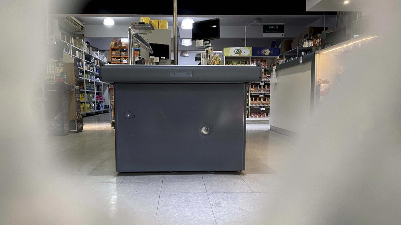 Picture of bullet holes in a supermarket belonging to the family of Antonela Roccuzzo, the wife of Argentine football star Lionel Messi, after attackers fired shots at the facade of the closed premises early in the morning and left a threat message to Messi, in Rosario, Santa Fe Province, Argentina. Pic/AFP