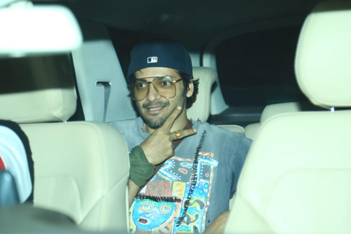 The 'Mirzapur' star, Ali Fazal strikes a cool pose as he gets papped at the screening. 