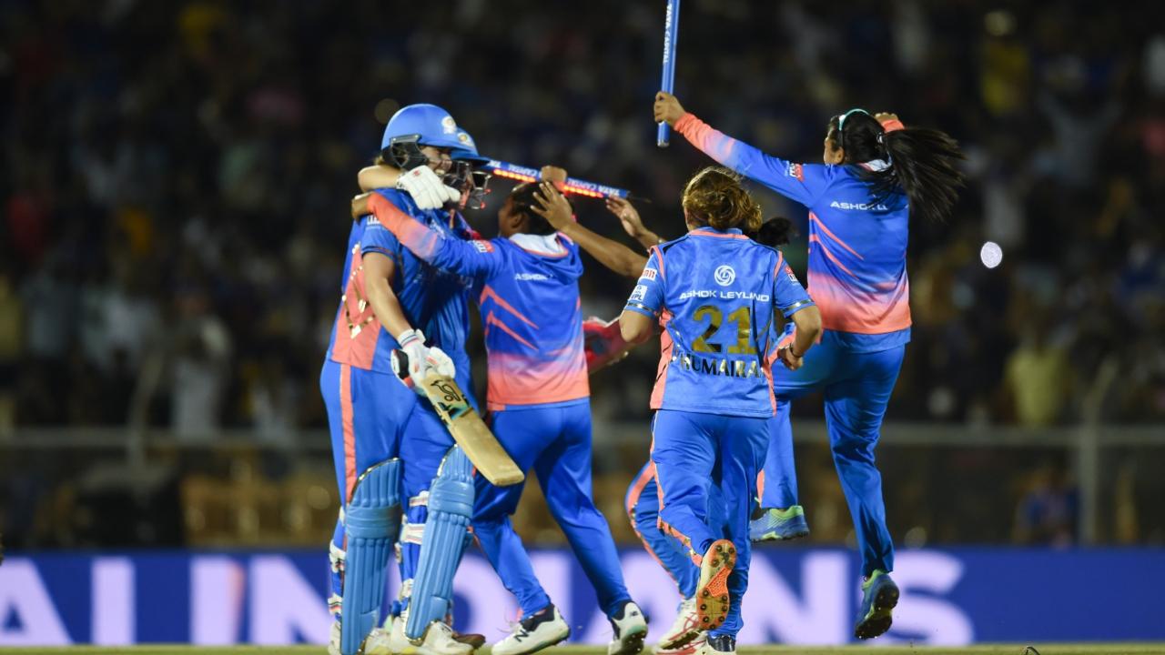 Mumbai Indians players raced into the ground in celebration as Sciver-Brunt struck a boundary off Alice Capsey's third delivery in the final over.