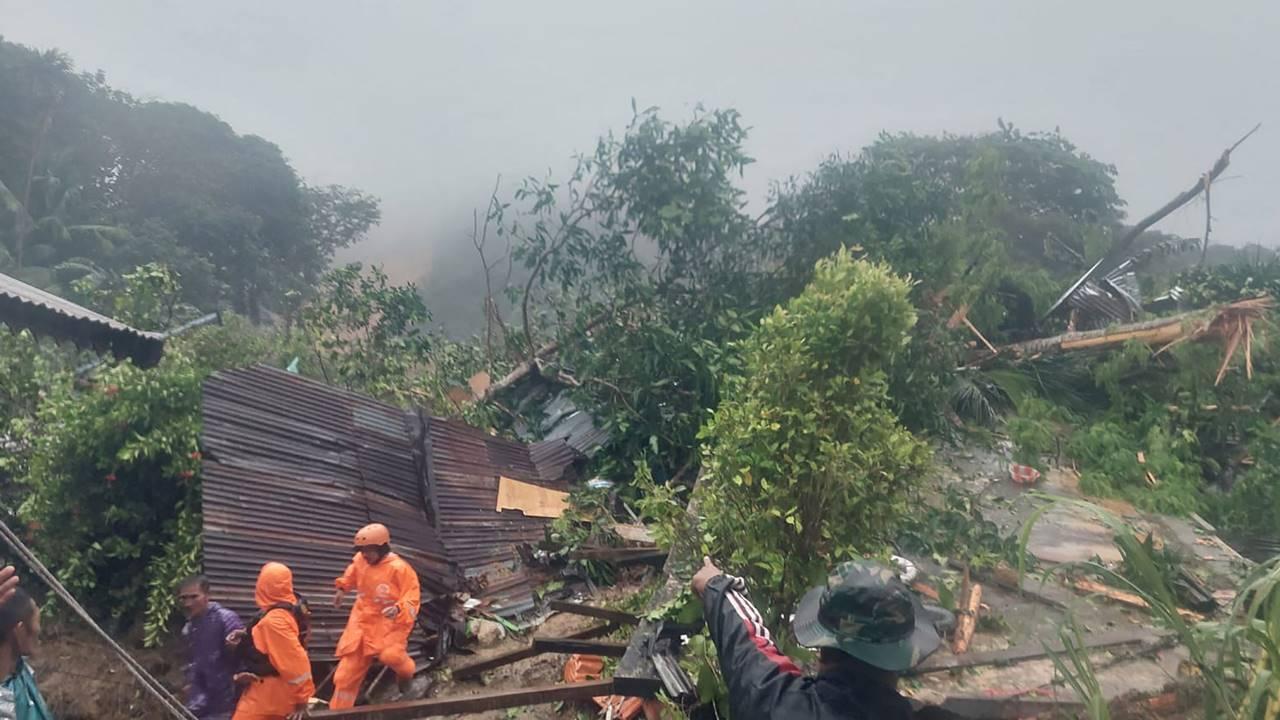 Indonesia: Rescuers search for dozens buried in landslides, eleven confirmed dead