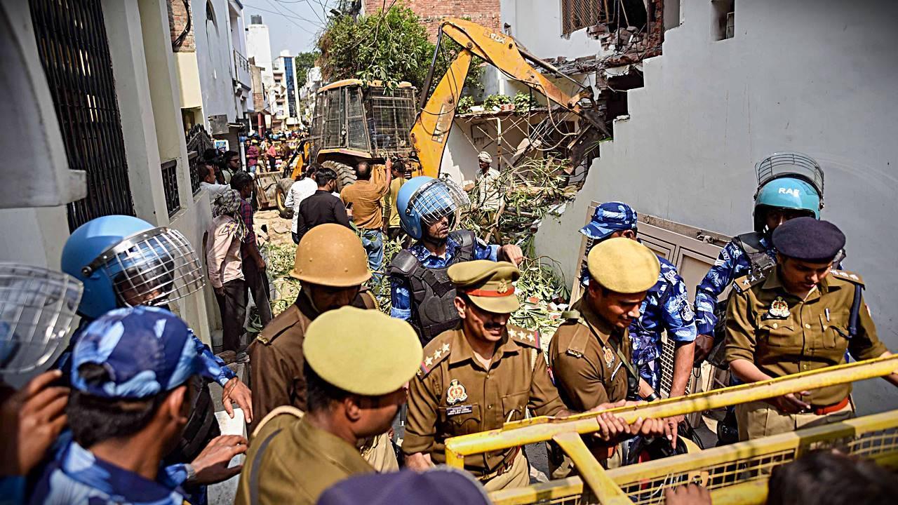 In Photos: Yogi govt bulldozes house of Atiq Ahmed’s aide in Prayagraj
