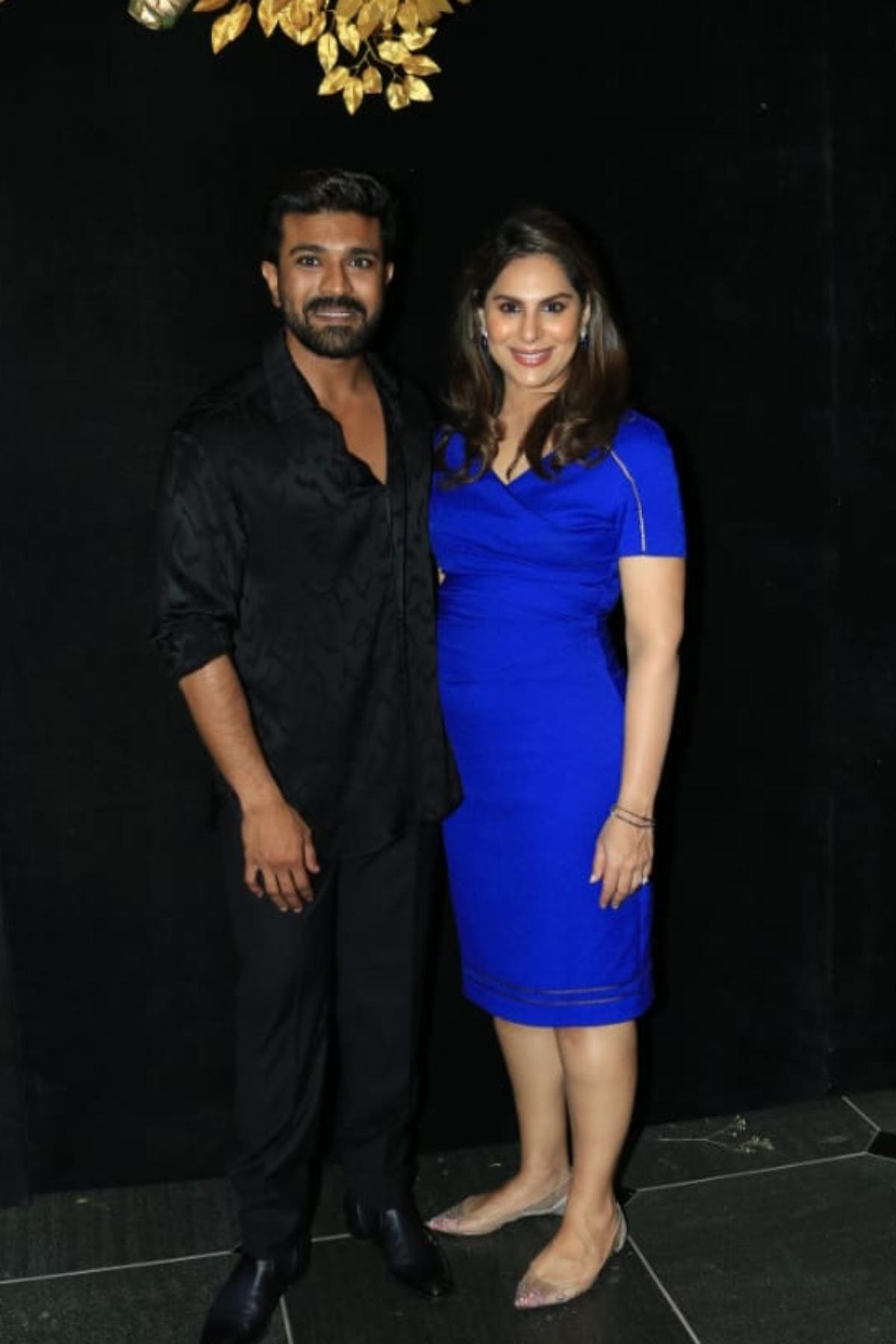 Birthday boy, Ram Charan was all smiles as he posed with his wife Upasana Konidela. While Ram chose to go all-black on his special day, his wife, Upasana looked beautiful as she flaunted her baby bump in a stunning blue dress. 