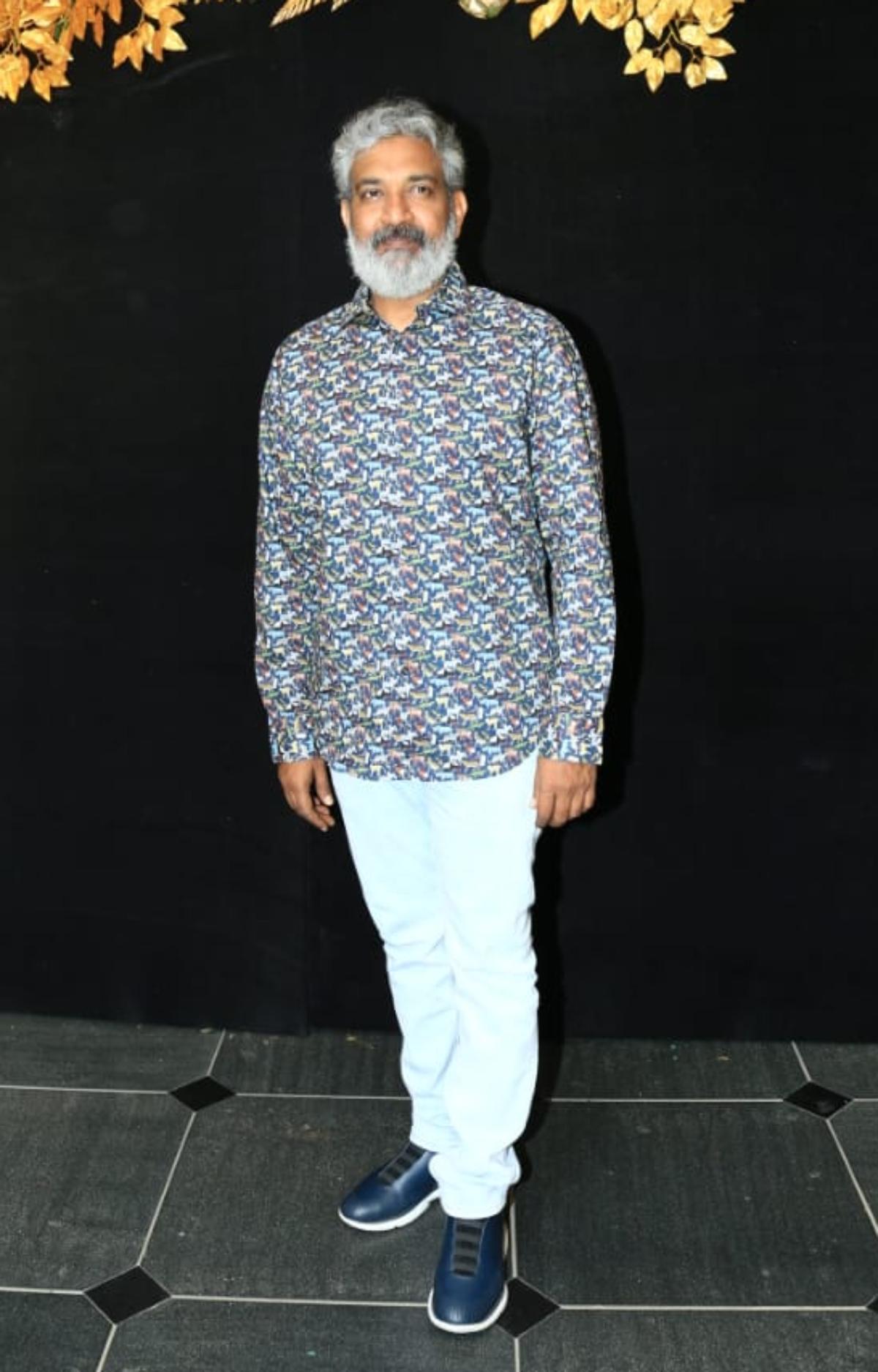 'RRR' director SS Rajamouli was one of the notable guests at Ram Charan's star-studded birthday party. 