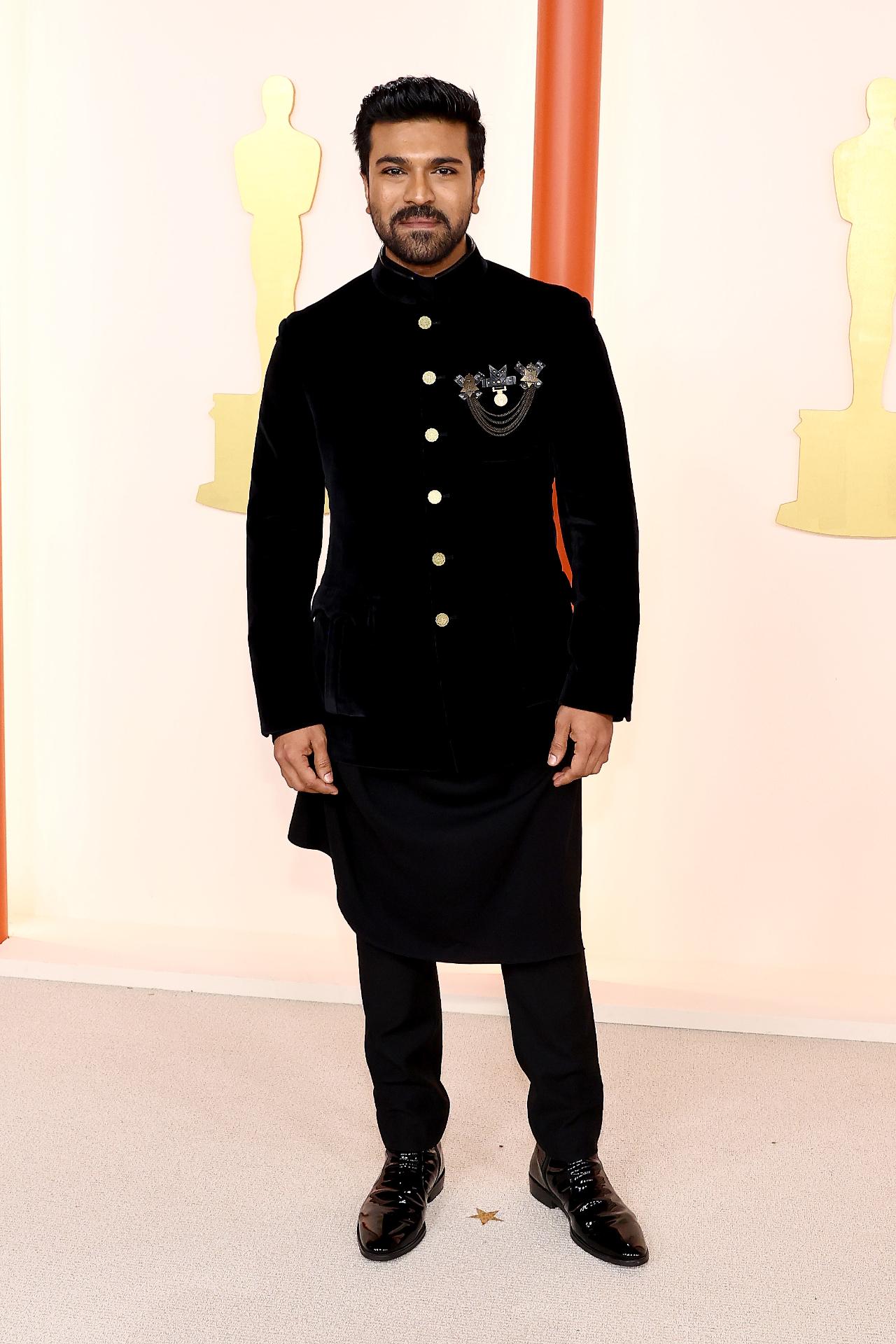 Ram Charan, representing India at the Oscars, is a matter of great pride for the entire country. The global star wore the Indian label, Shantanu & Nikhil, with immense honor. Styled by Nikita Jaisinghani, the suave Ram Charan wore a sharp bandh-gala for the awards. 