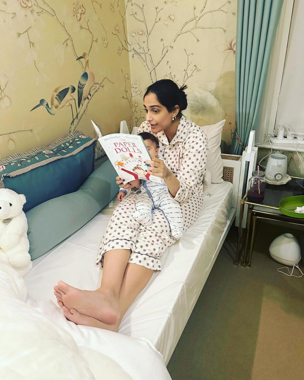 The actress can be seen reading to her son. The book 'Paper Dolls' even caught actress Kareena Kapoor Khan's eye as she comments, 