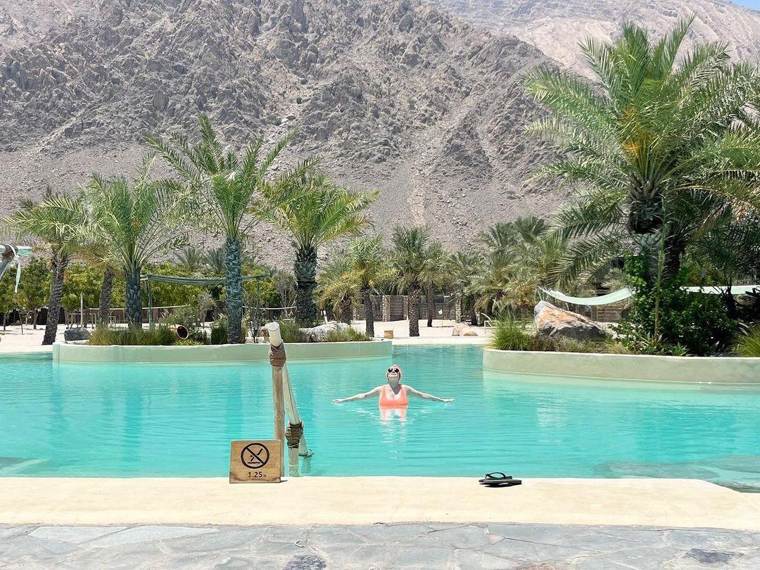 A day prior, Lohan posed in a distant shot where she was submerged in a pool with her arms stretched out around her during her stay in Oman. 