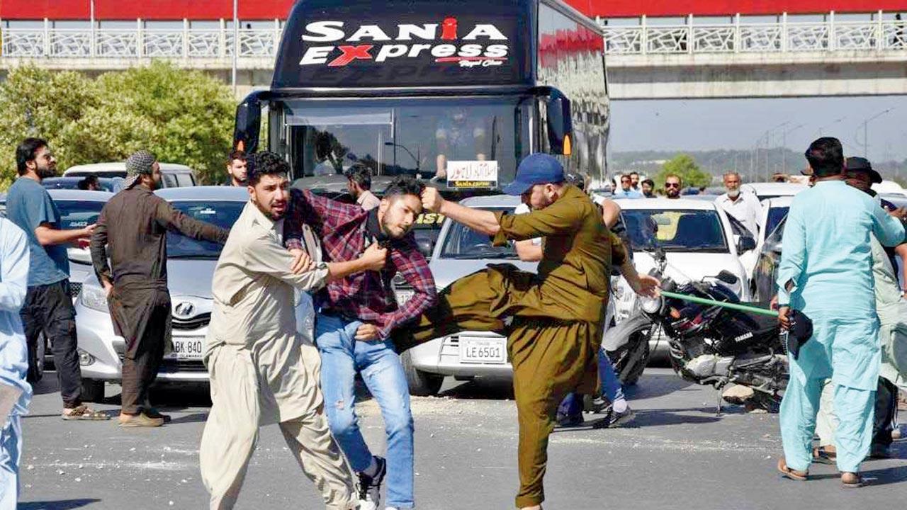 Plainclothes police officers beat up a protesting supporter in Peshawar on Tuesday