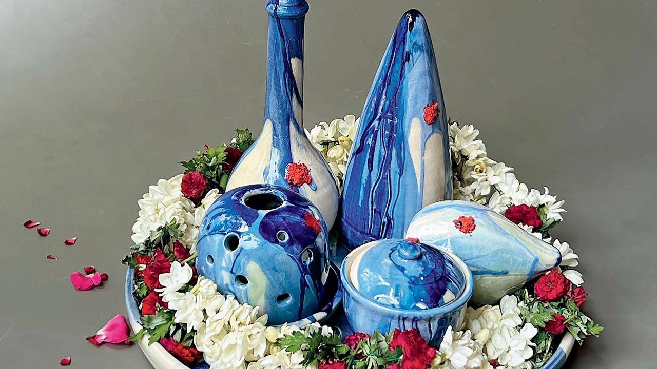 This blue and white saes set with flowers features in Adil Writer’s #RootedObjects series. Pic courtesy/Adil writer