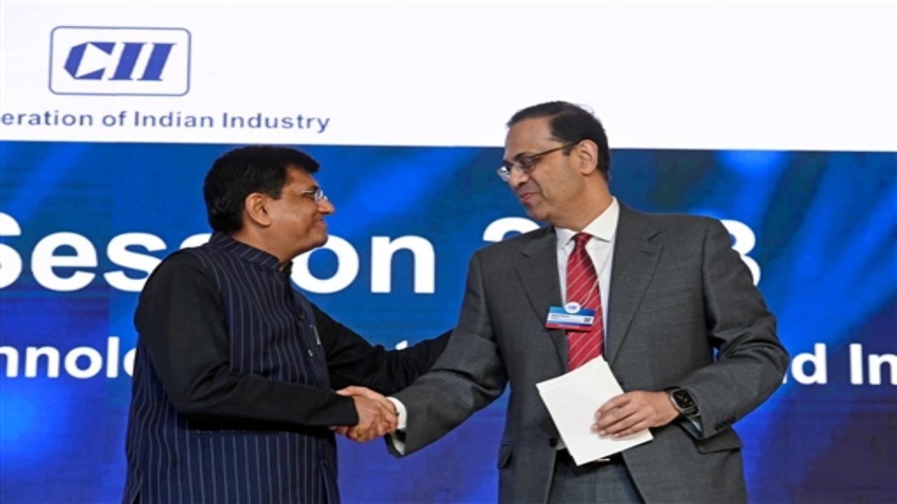 Union Minister Piyush Goyal shakes hands with CII President Sanjiv Bajaj at the CII Annual Session on 'Future Frontiers: Competitiveness, Technology, Sustainability, Internationalization', in New Delhi on Wednesday. ANI Photo