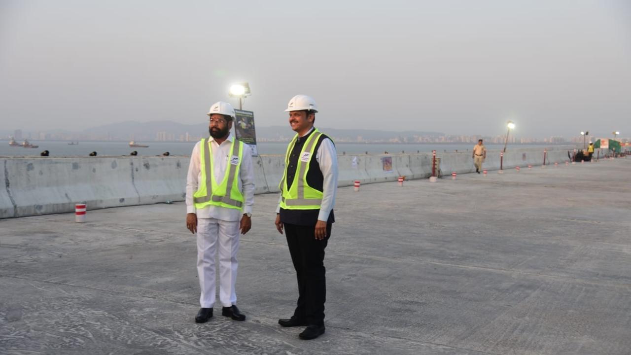 During their visit, CM Eknath Shinde and Devendra Fadnavis were seen taking a review of the project which is nearing completion and is expected to be open for traffic by November this year. The project entails the construction of an 18-km-long marine road and a four-km-long land approach road that will connect central Mumbai with Navi Mumbai across Mumbai Bay