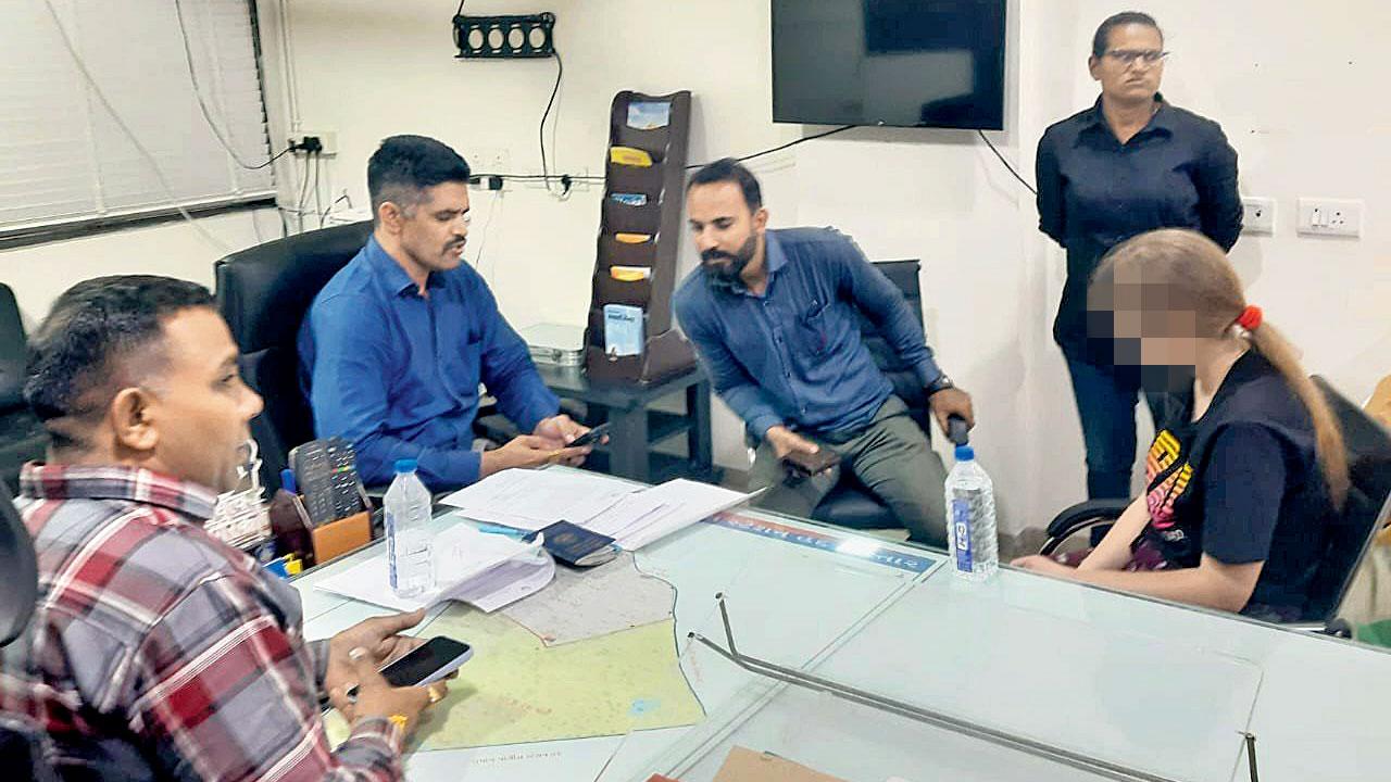 The Gujarat police team with the teenager