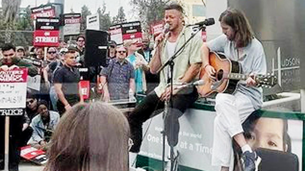 Imagine Dragon band members at the writers’ protest