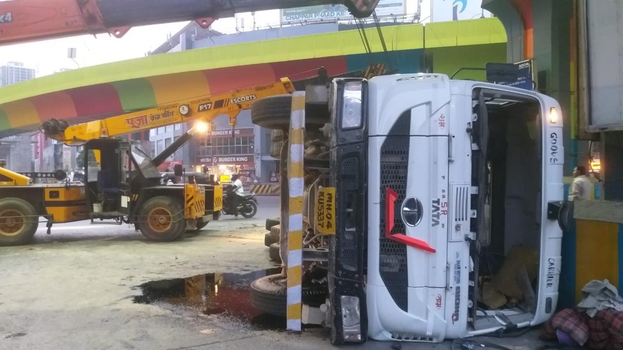 Maharashtra: Cement-mixer truck overturns in Thane
