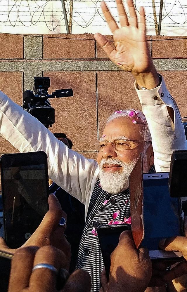 PM Modi said he speaks confidently of India and its people`s strengths abroad and the world listens because people here elected a majority government