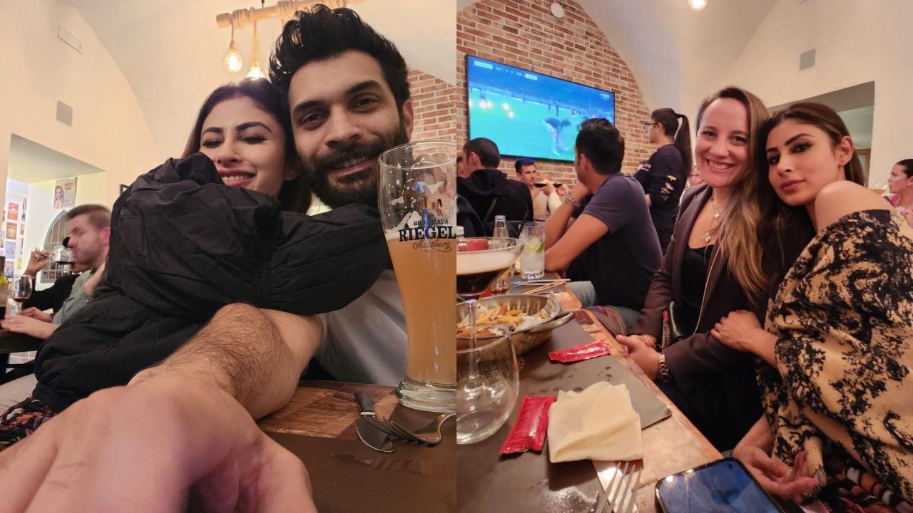 Mouni is seen clicking selfies with her husband, Suraj Nambiar, and other friends at dinner in Italy.