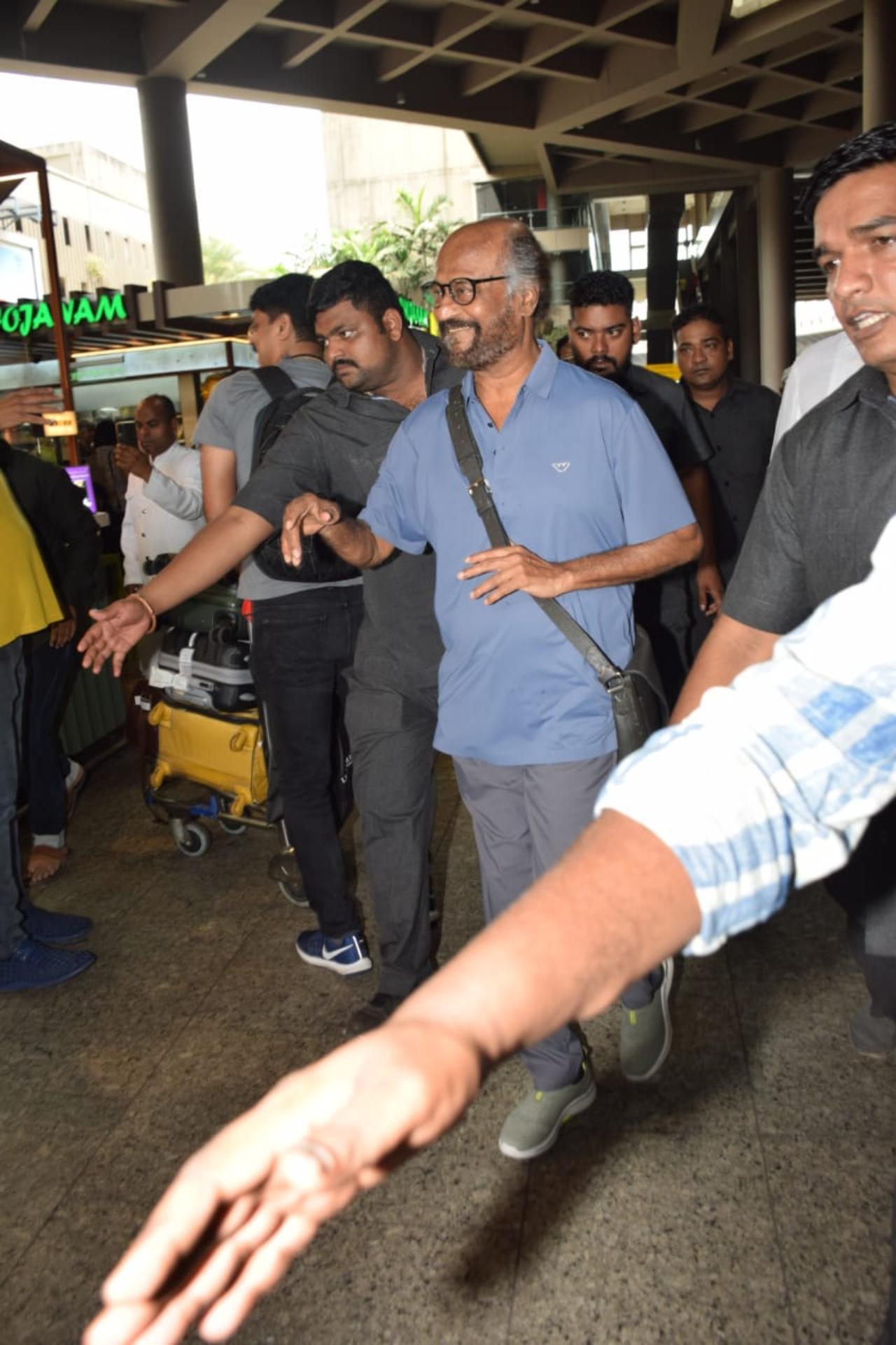 Rajinikanth was seen in a sky-blue T-shirt, casual track pants, and walking shoes at the airport. He was seen carrying a satchel along with him as he made his way out of the airport