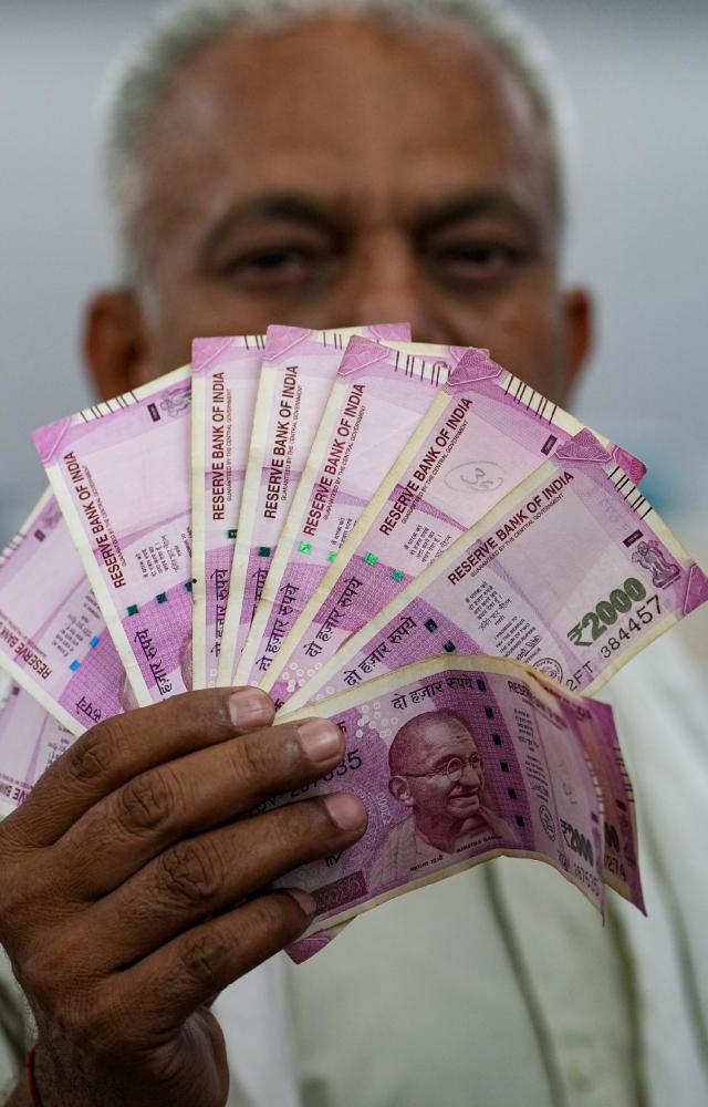 A person can exchange up to a limit of Rs 20,000 at a time without filling any form or requisition slip