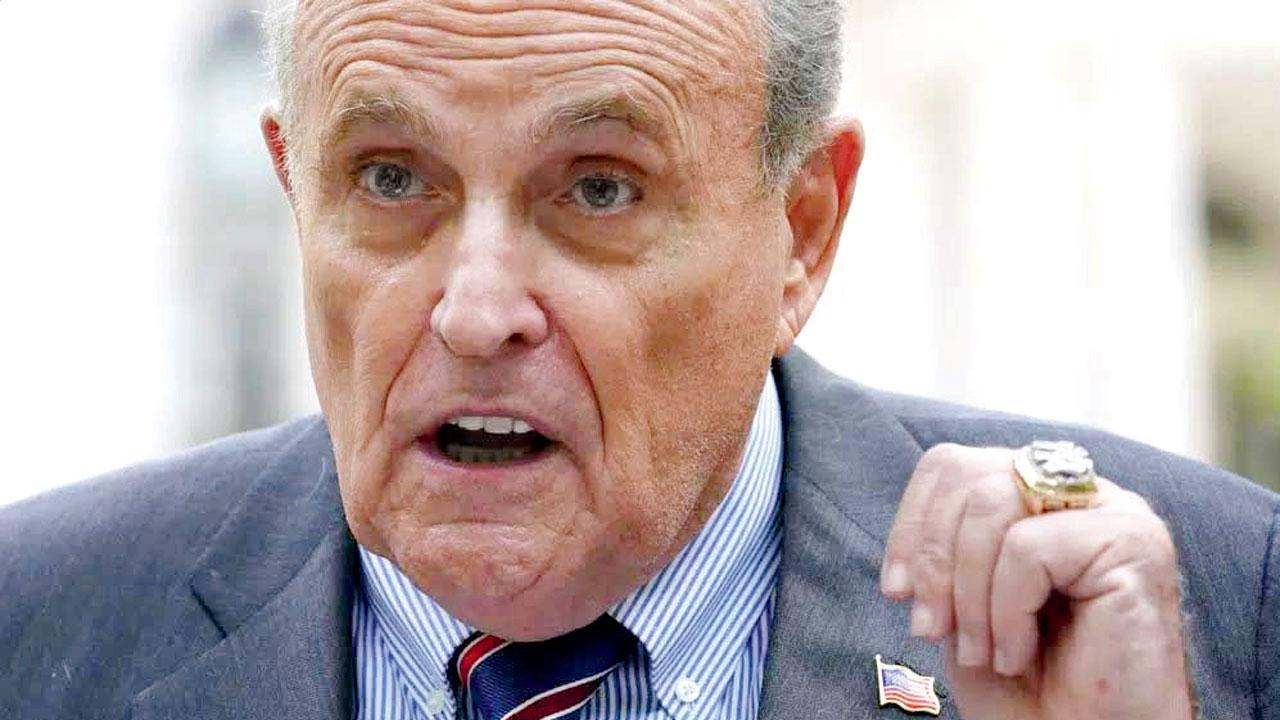 Woman sues Rudy Giuliani, says he coerced her into sex
