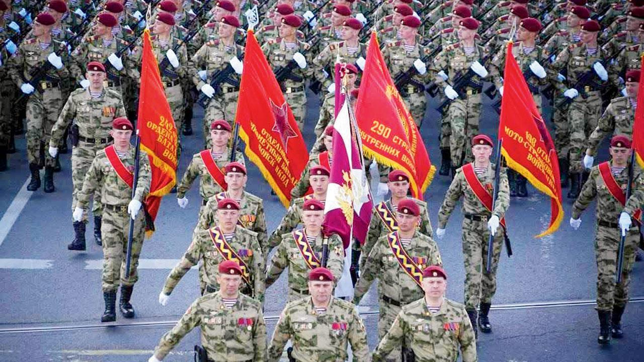 Vladimir Putin tells WWII event West is waging a ‘real war’ on Russia
