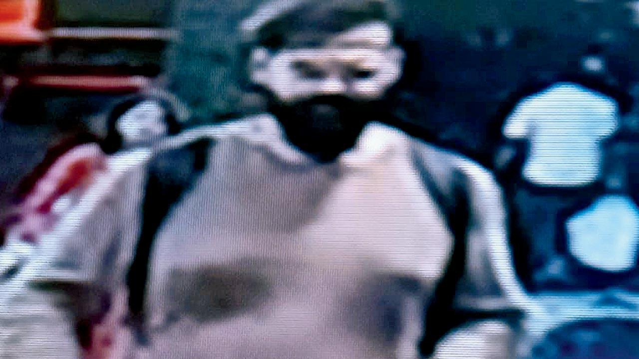 The gangster, as he was captured by a CCTV camera at Vashi station