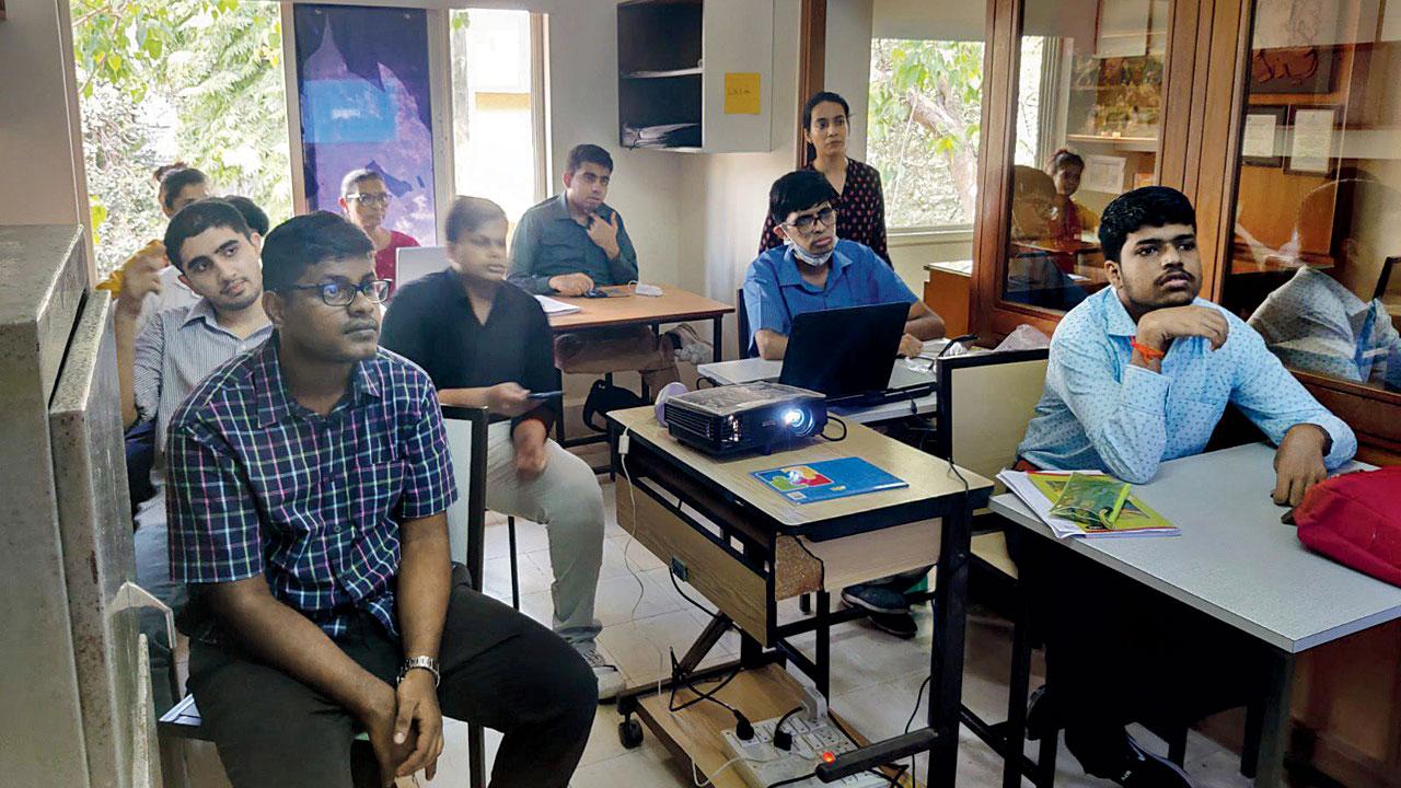 A training session by v-shesh on life skills and use of assistive technology held for persons with neurodivergence