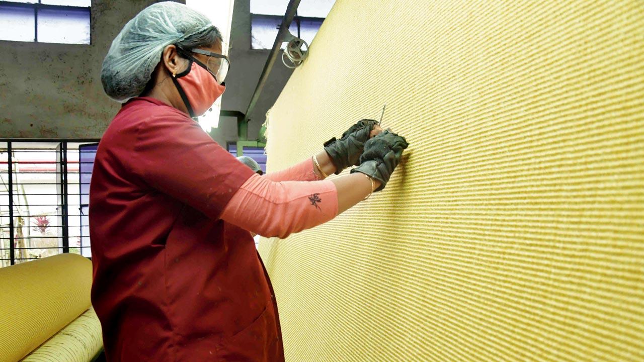 While the Met Gala carpet was machine-made, several of the processes in its manufacture were hand done, including correcting of knots usually done by skilled women workers