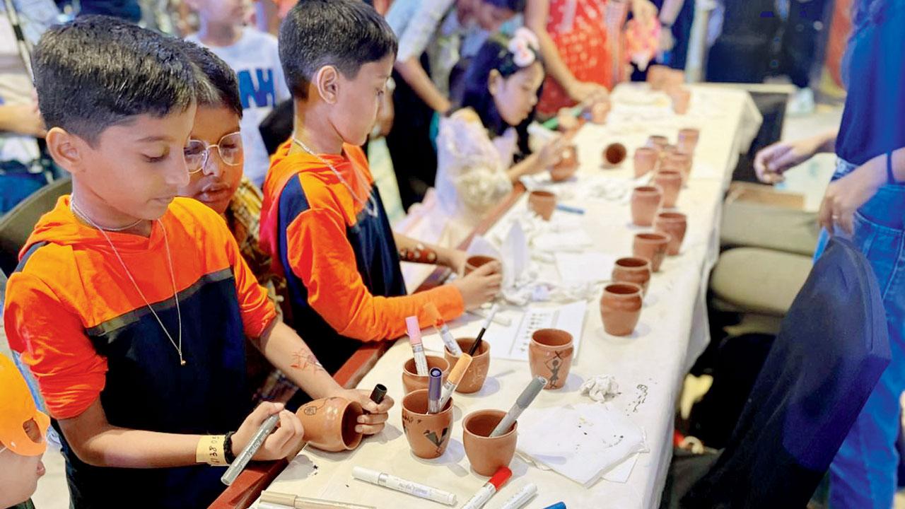 The Warli kulhad painting workshop is one of the 25 workshops at the festival. The aim of this workshop is to revive the folk arts of Maharashtra and support local artisans, from whom the kulhads are sourced