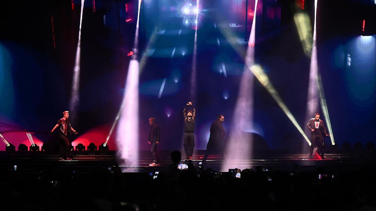 The band exhibited youthful energy on stage coupled with internal jokes, and camaraderie that goes back three decades. Photo Courtesy: AFP