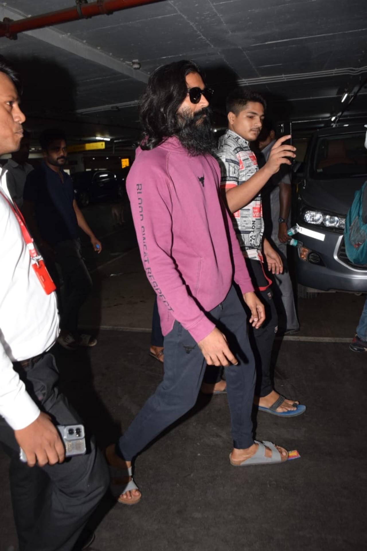 Indian superstar Dhanush was spotted at Mumbai airport on Monday morning. The actor took everyone by surprise with his new look