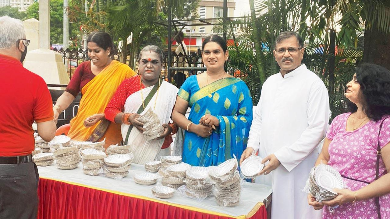 Women from the transgender community at the Malad church selling the plates they made