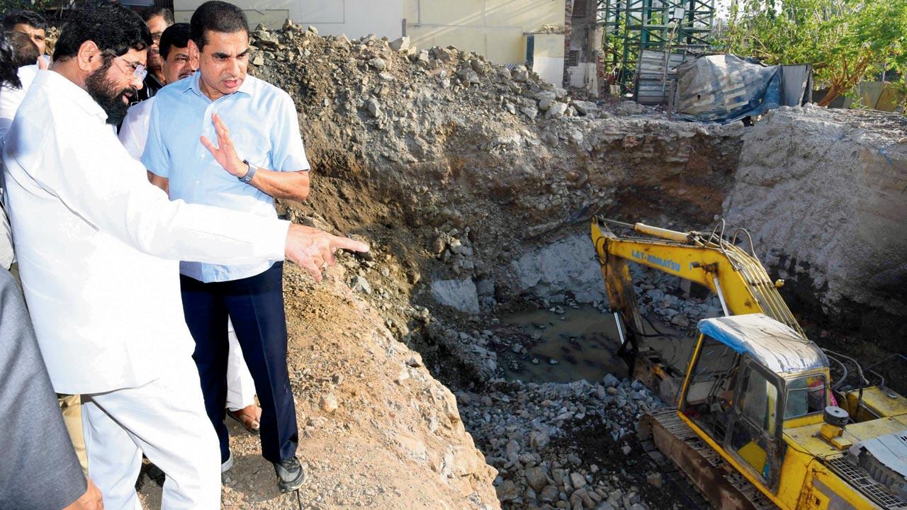 CM Eknath Shinde and civic chief during the checks on nullah cleaning work done in the city on Friday